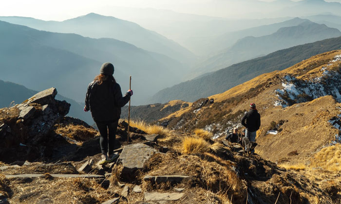 Woman hiking on mountain top